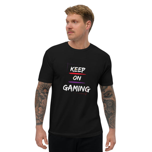 Man in black t-shirt that says keep on gaming