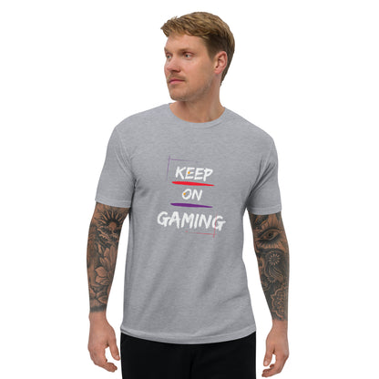 Man in heather grey t-shirt that says keep on gaming