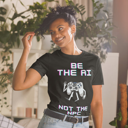Woman in black short-sleeve t-shirt that says be the AI not the NPC