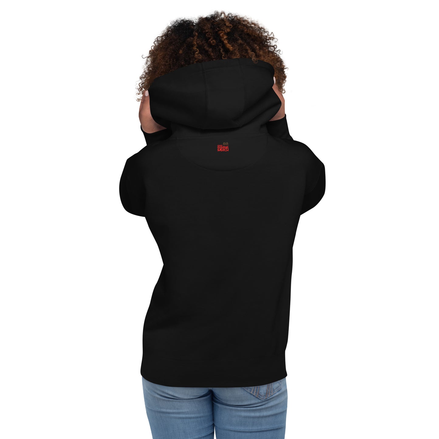 Woman, facing away in black hoodie with outside label