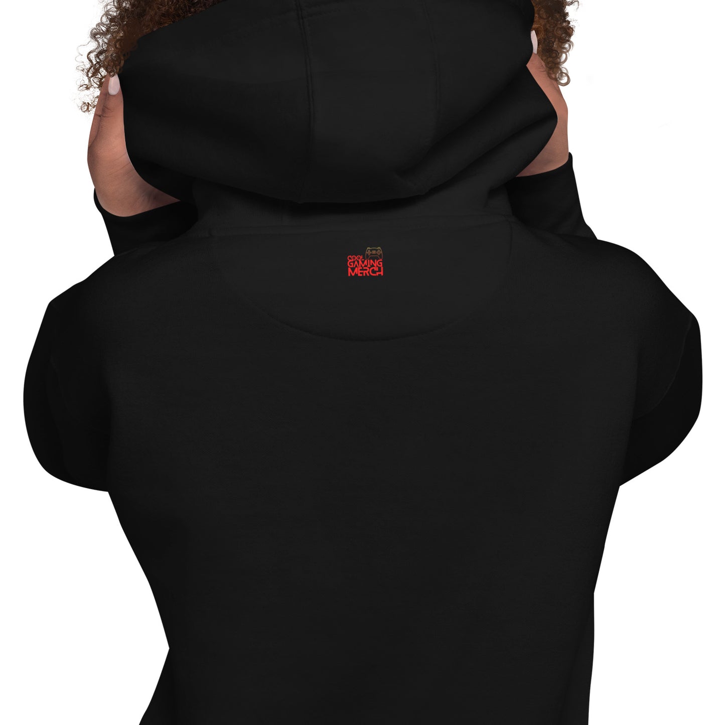 Woman, facing away in black hoodie with outside label (close camera)